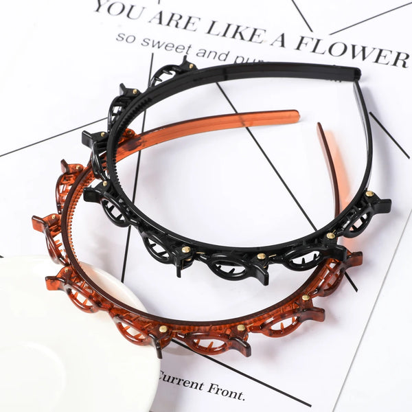 Double layer pearl hair hoops in black and amber wood tones displayed on a white background.