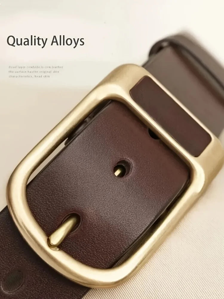 A close-up of a brown leather strap and gold-toned buckle for a men's coboy style PU belt.
