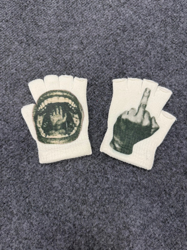 Pair of white fingerless knit gloves with a dark print of a hand and a finger pointing