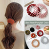 Red and pink elegant horsetail hair clips for ponytails and buns displayed on a white surface.