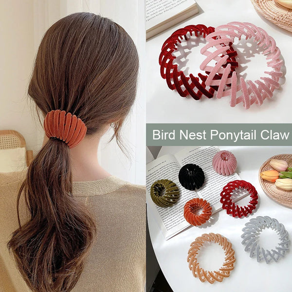 Red and pink elegant horsetail hair clips for ponytails and buns displayed on a white surface.