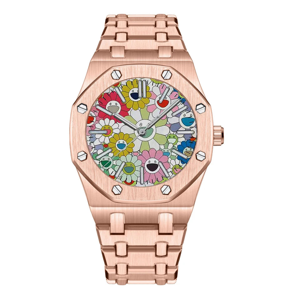 A rose gold retro luminous quartz wristwatch with a colorful, floral dial and textured metal band.